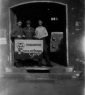 Holding 6th Unit Sign