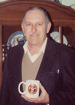 Bill-Oettle-holding-TD-Mug